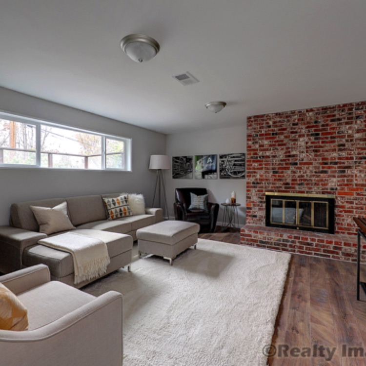 Enjoy your comfy Bonus Room on the lower level with its gas fireplace.
